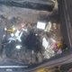 Under the passenger seat.